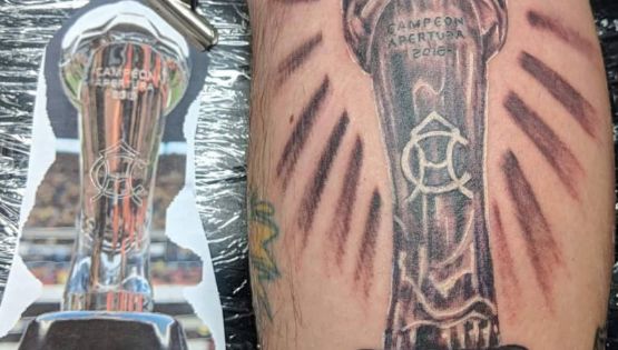 Americanista se Tatúa el Título 13